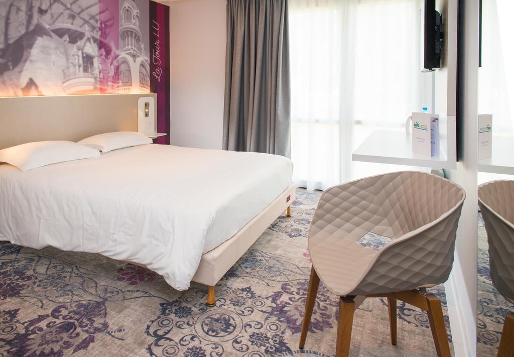 Brit Hotel Nantes Vigneux - L'Atlantel Esterno foto
